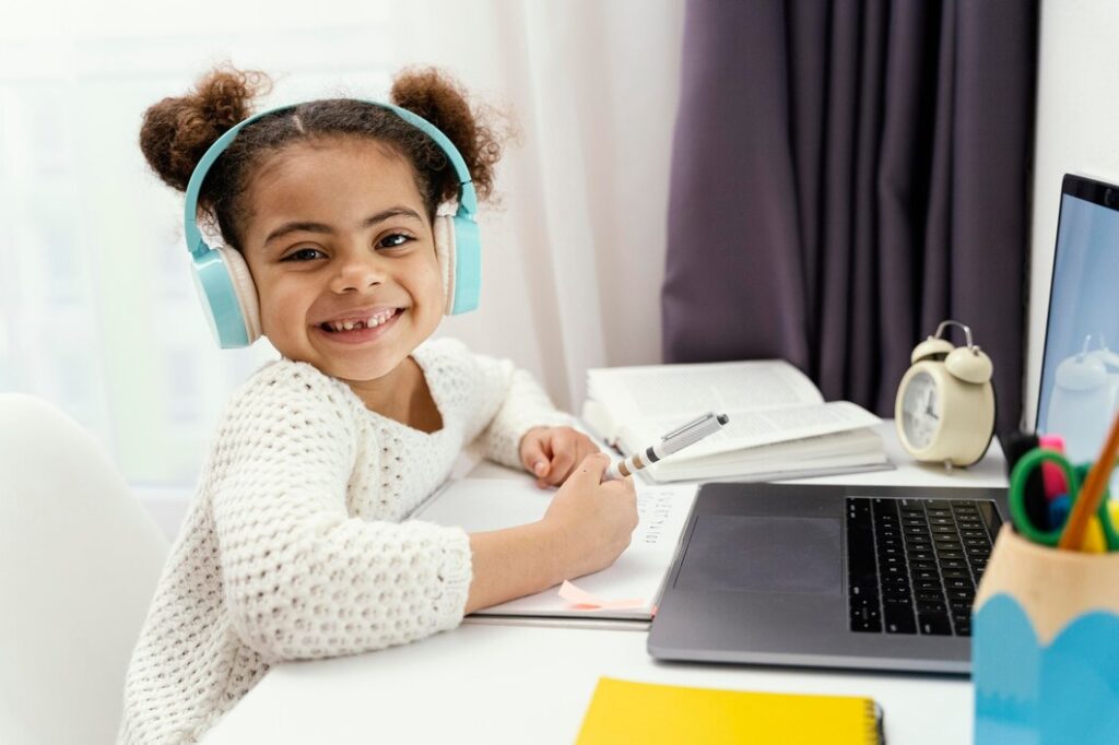 Primary school student engaged in English tutoring session.