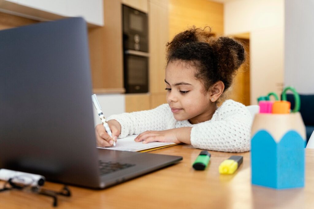 Primary school science tutor helping a child explore basic concepts.