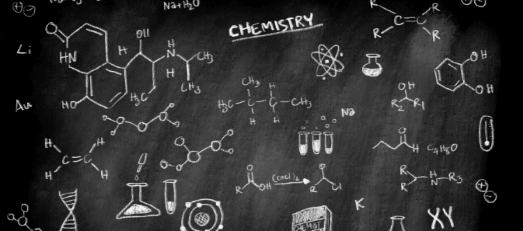 Chalkboard filled with chemistry doodles, including molecular structures, laboratory equipment, and formulas labeled 'Chemistry'.